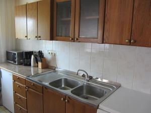 Kuchyň nebo kuchyňský kout v ubytování Apartments Marijana