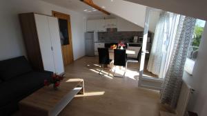 Kuchyň nebo kuchyňský kout v ubytování Apartments Marijana