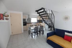 Kuchyň nebo kuchyňský kout v ubytování Appartement neuf tout confort