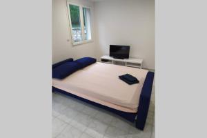 Postel nebo postele na pokoji v ubytování Appartement neuf tout confort