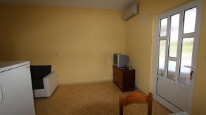 TV a/nebo společenská místnost v ubytování Apartments Gržetić