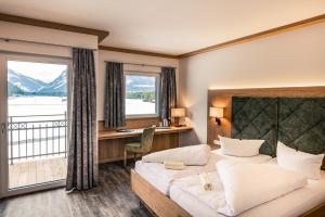 Katil atau katil-katil dalam bilik di Hotel Föhrenhof