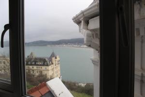 a view of the water from a window at Headlands Hotel in Llandudno