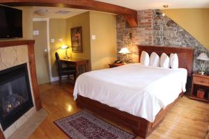 Tempat tidur dalam kamar di Hotel Acadia