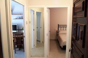 Posteľ alebo postele v izbe v ubytovaní apartament dúplex "Alsina"