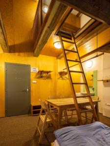 Postel nebo postele na pokoji v ubytování Zámecký Hostel Litomyšl