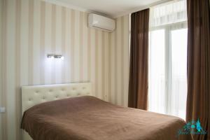 Cama ou camas em um quarto em Your Apartments Batumi