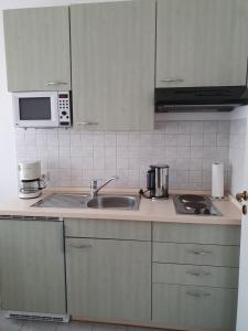 Kuchyň nebo kuchyňský kout v ubytování Hotel Sophien-Café