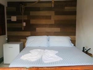Postel nebo postele na pokoji v ubytování Pousada O Rancho Alegre