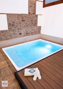 Bazén v ubytování Ágora Casa nebo v jeho okolí