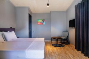 Postel nebo postele na pokoji v ubytování Magnetic Resort Ureki