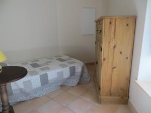 Postel nebo postele na pokoji v ubytování Le Mas des Restanques