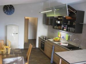 a kitchen with a sink and a counter top at Haus Panorama in Oy-Mittelberg