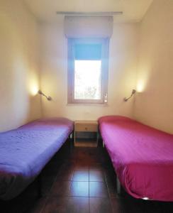 Postel nebo postele na pokoji v ubytování Villaggio White Star