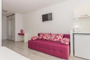 TV a/nebo společenská místnost v ubytování Apartmani Katarina