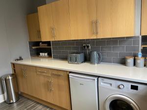 Kuchyň nebo kuchyňský kout v ubytování Bridge street apartment + 7 fotografií