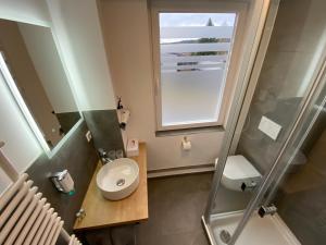 Koupelna v ubytování Hotel Wappenhof + 37 fotografií