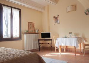 Televízia a/alebo spoločenská miestnosť v ubytovaní Cà Vincenzona, Wellness Area