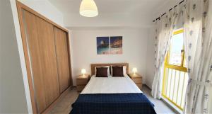 Postel nebo postele na pokoji v ubytování T1 Dunas 7 - Aconchegante, Wifi, 150mt Praia