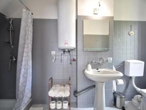 a white bathroom with a sink and a shower at Nemo Mielenko in Mielenko +33 photos