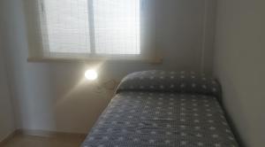 Postel nebo postele na pokoji v ubytování Apartament Sara