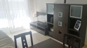TV a/nebo společenská místnost v ubytování Apartament Sara