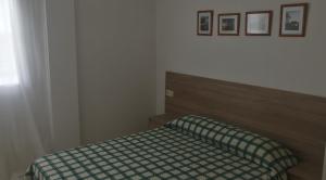 Postel nebo postele na pokoji v ubytování Apartament Sara