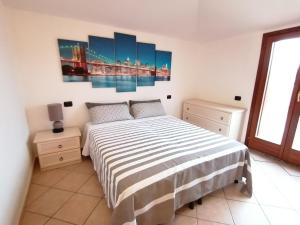 A bed or beds in a room at Residenza Gallura
