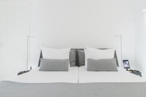 Een bed of bedden in een kamer bij Prinsenhof Suite