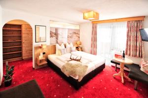 En eller flere senge i et værelse på Apart Almrausch