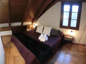 Posteľ alebo postele v izbe v ubytovaní Ca Solleta, casa de montaña a 20 min de la Peülla, Vaqueira-Beret