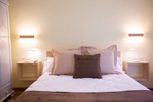 A bed or beds in a room at La Casona de Cardes