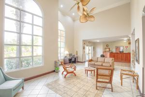 a living room with a couch and chairs at Quality Inn in Gulf Shores