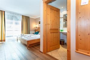 Llit o llits en una habitació de Landgasthof Fürstenbrunn