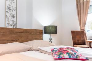 Llit o llits en una habitació de Landgasthof Fürstenbrunn
