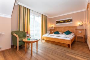 Llit o llits en una habitació de Landgasthof Fürstenbrunn