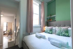 Ένα ή περισσότερα κρεβάτια σε δωμάτιο στο Studio Stay City Haven Preston +26 φωτογραφίες