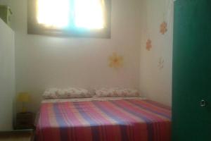 Postel nebo postele na pokoji v ubytování Appartamento accogliente