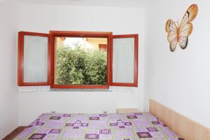 Postel nebo postele na pokoji v ubytování Appartamenti Ideal