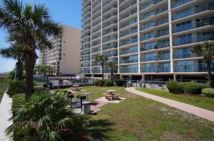 a park in front of a large apartment building at Ashworth 1704 in Myrtle Beach