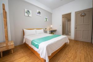 Postel nebo postele na pokoji v ubytování No Smoking INN + 13 fotografií