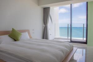 Postel nebo postele na pokoji v ubytování BEACH FRONT VILLA