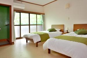 Katil atau katil-katil dalam bilik di 山葵-WASABI