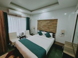 Postel nebo postele na pokoji v ubytování Chautari Boutique Hotel