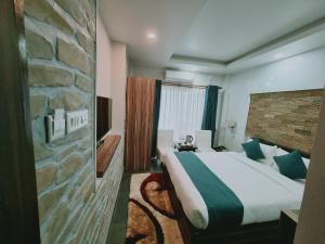 Postel nebo postele na pokoji v ubytování Chautari Boutique Hotel