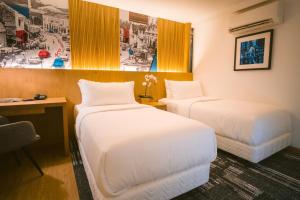 Postel nebo postele na pokoji v ubytování Indie Hotel Kuala Lumpur