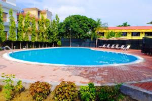 Hotel Nirvana by Luxury International tesisinde veya buraya yakın yüzme havuzu