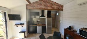 Kuchyň nebo kuchyňský kout v ubytování Appartement Ychoux + 4 fotografie