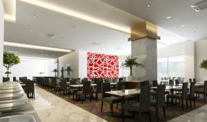 En restaurang eller annat matställe på Raia Hotel & Convention Centre Kuching