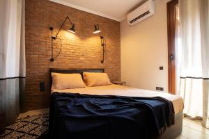 Posteľ alebo postele v izbe v ubytovaní Porto Thea Alexandra Shared Pool Villa, Afytos